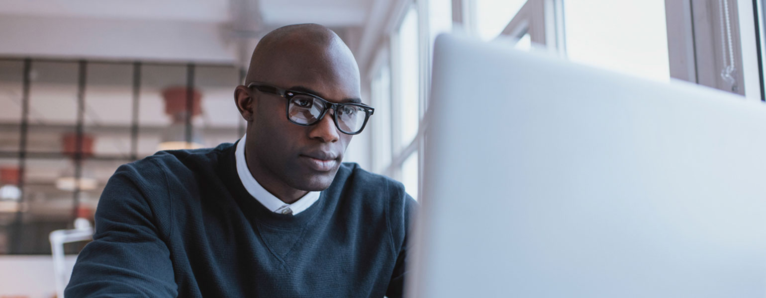 Man using a computer.